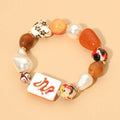 ORANGE STONE DRAGON BRACELET