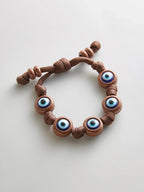 KNOTTY GOOD EYE CORD BRACELET  BROWN
