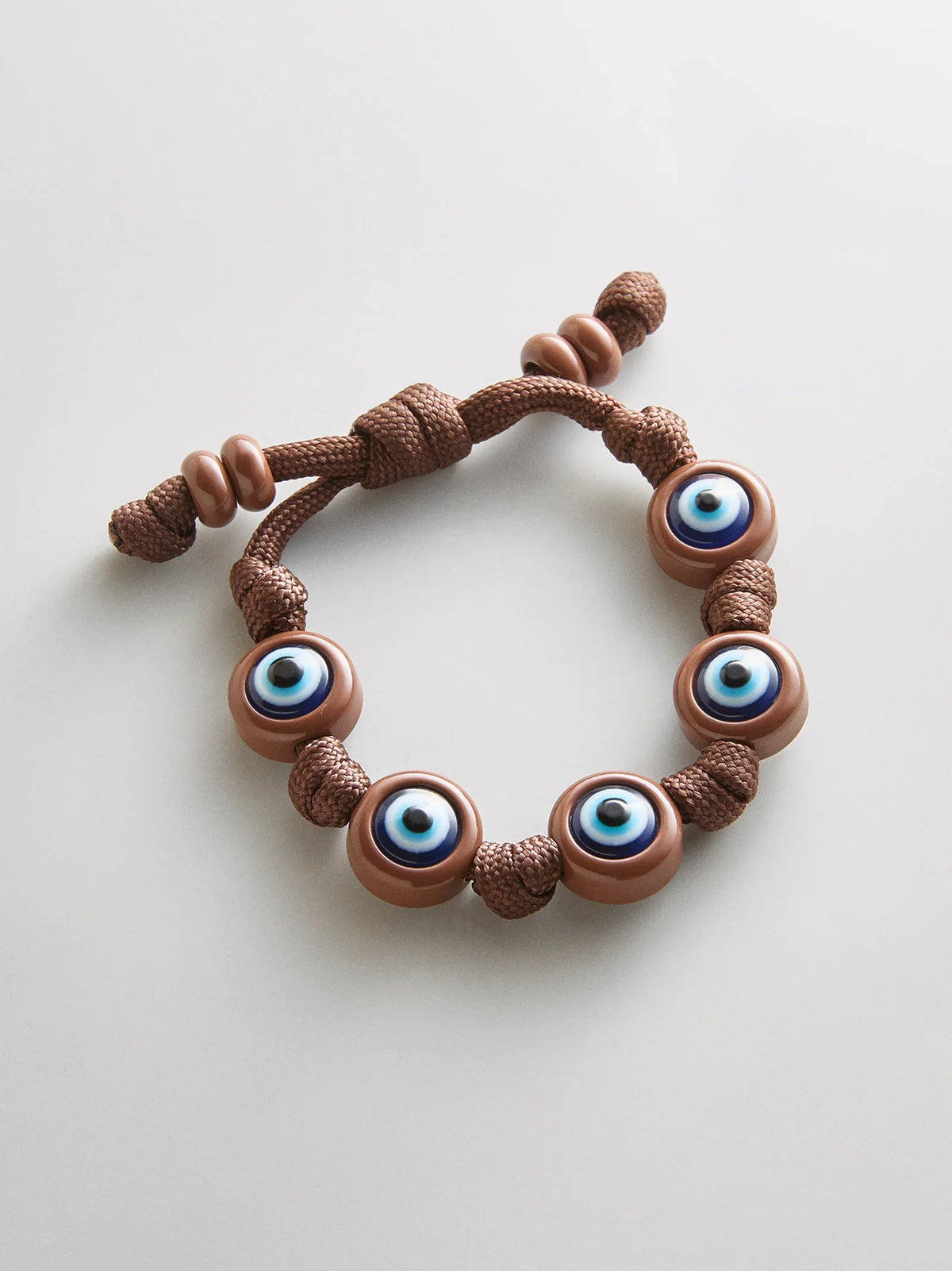 KNOTTY GOOD EYE CORD BRACELET  BROWN