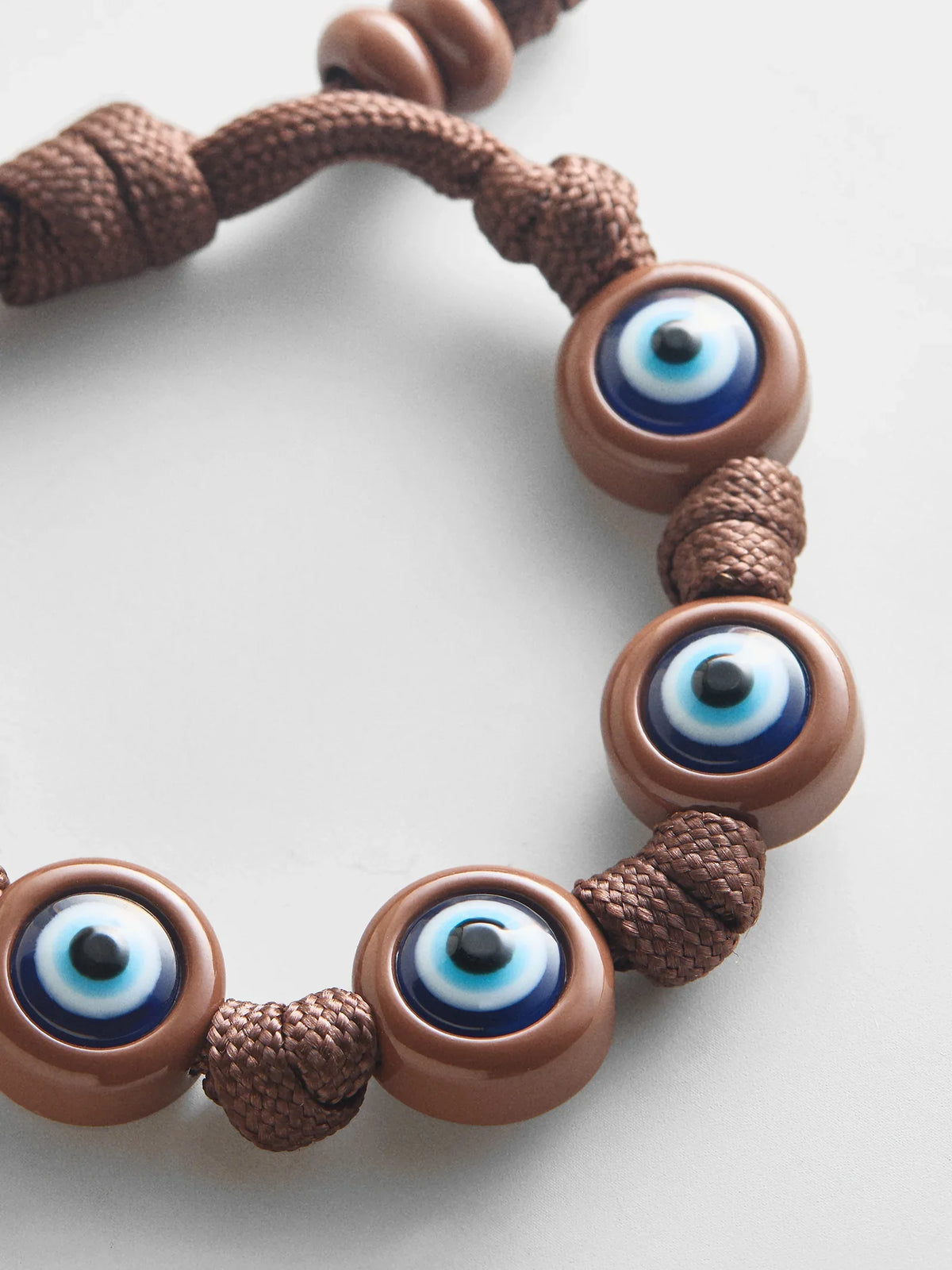 KNOTTY GOOD EYE CORD BRACELET  BROWN
