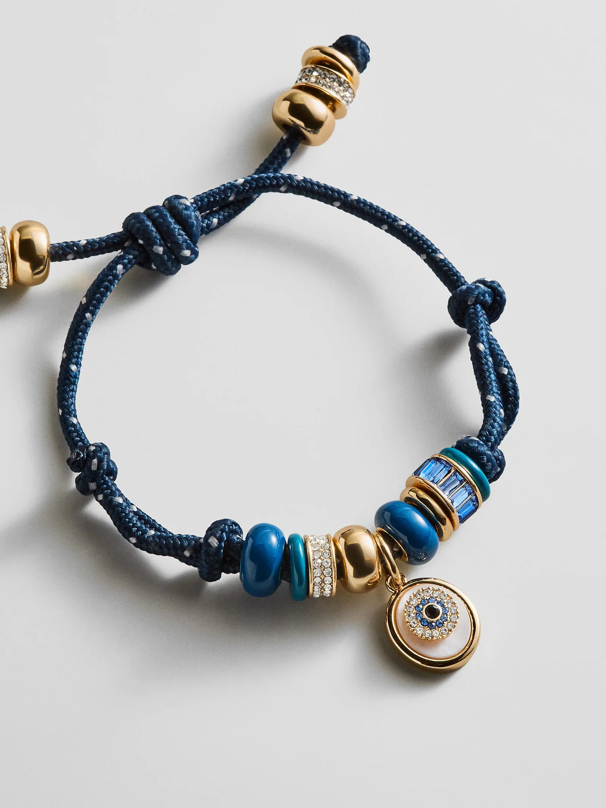 EYE CANDY EVIL EYE CORD BRACELET
